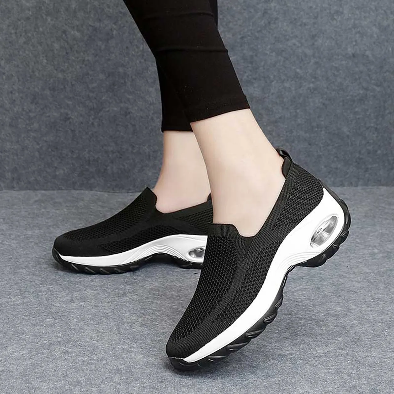 Black casual flyknit slip on double rocker bottom sneaker