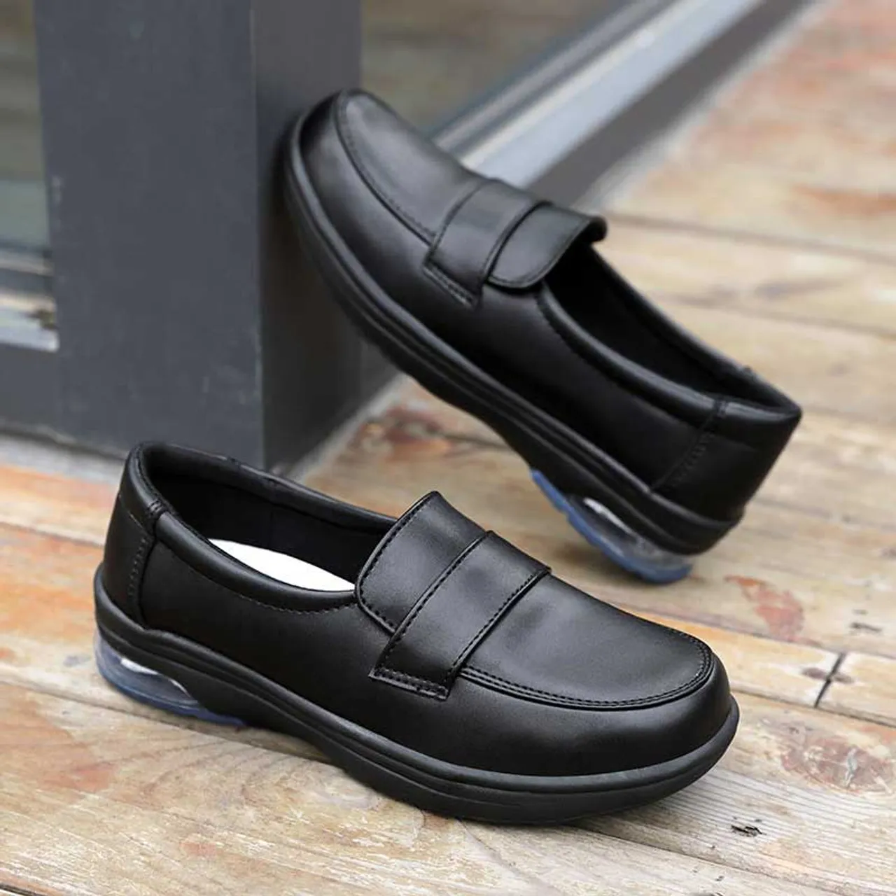 Black penny strap casual slip on shoe loafer