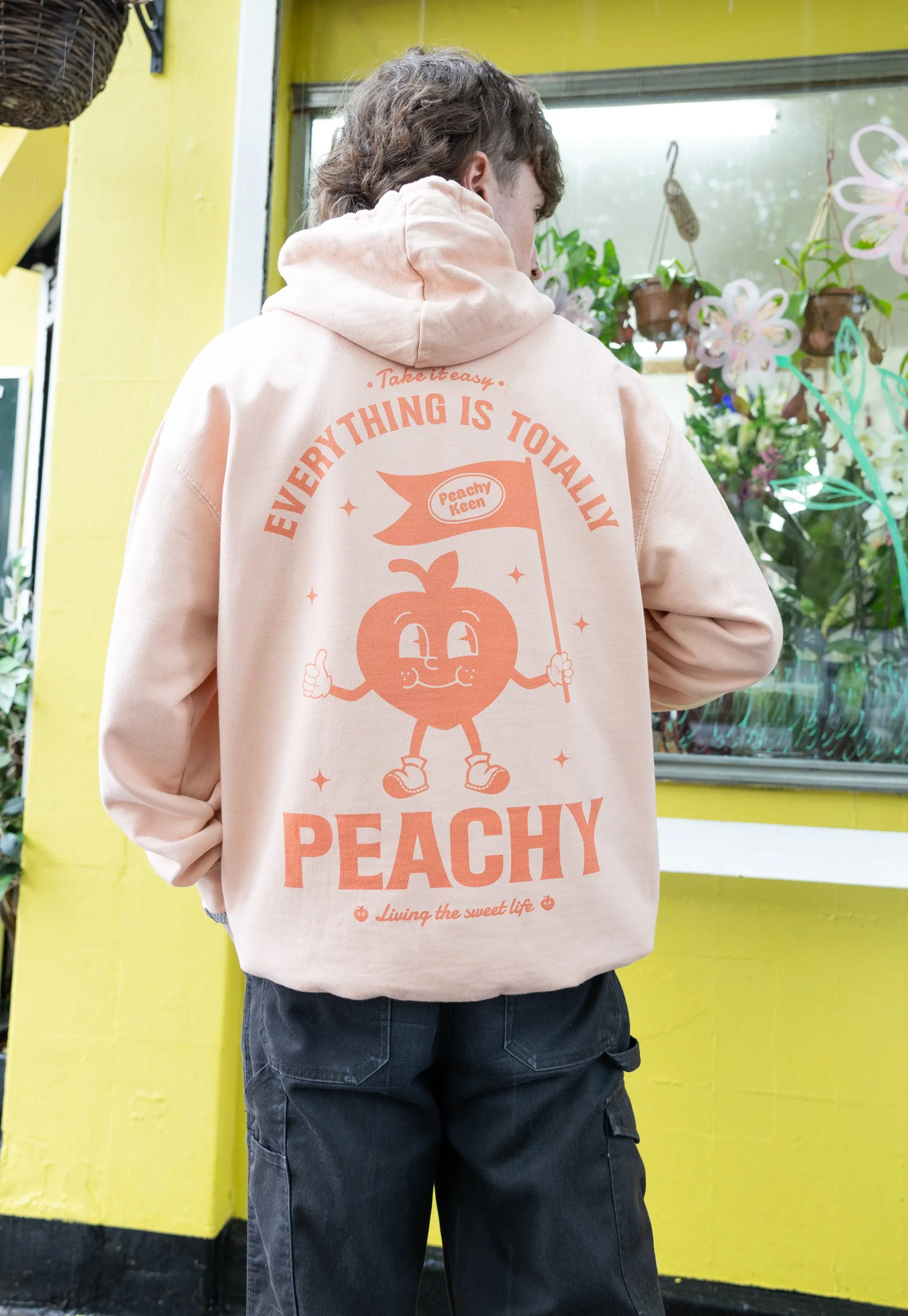 Everything Is Peachy Graphic Hoodie in Peach