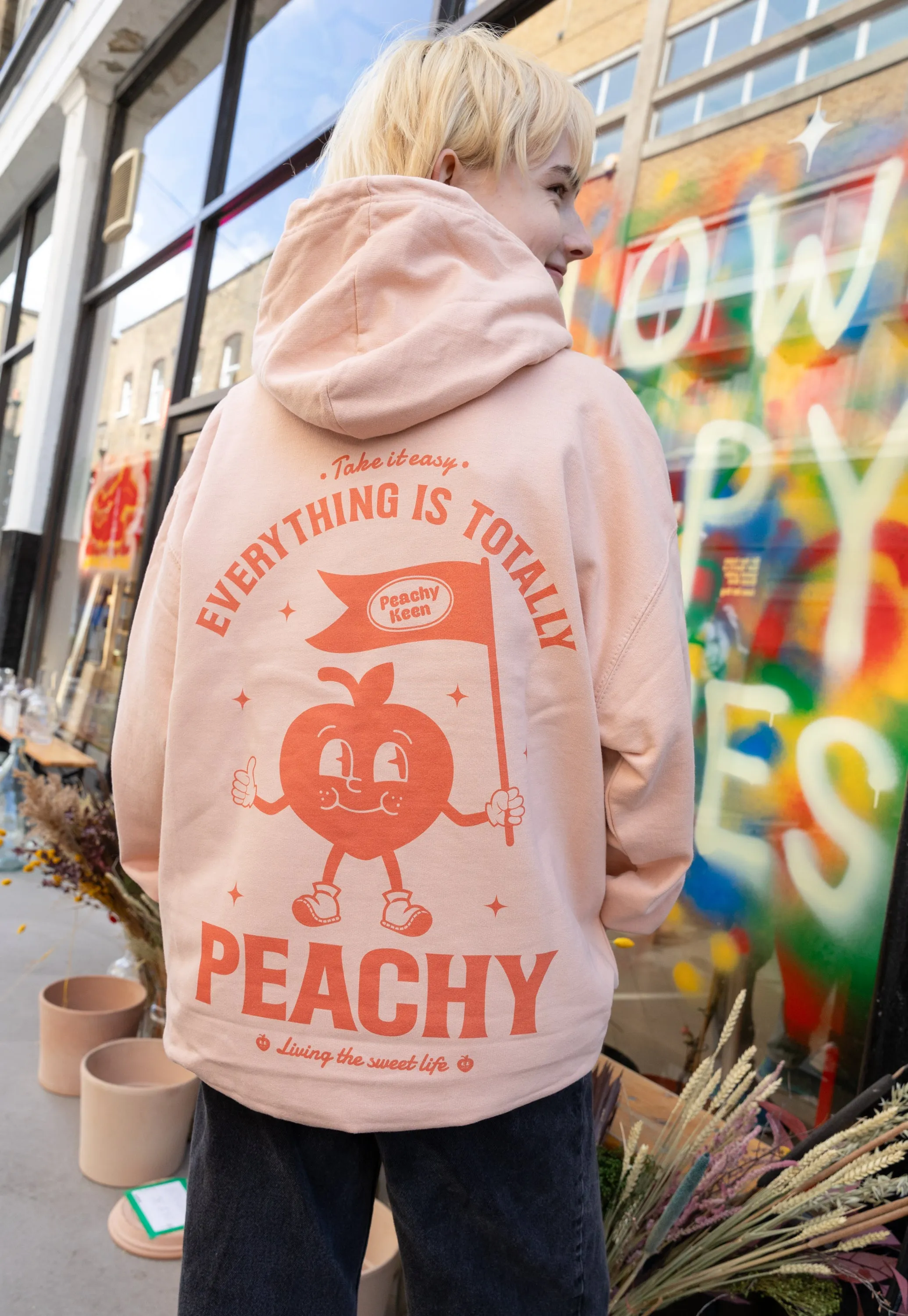 Everything Is Peachy Graphic Hoodie in Peach