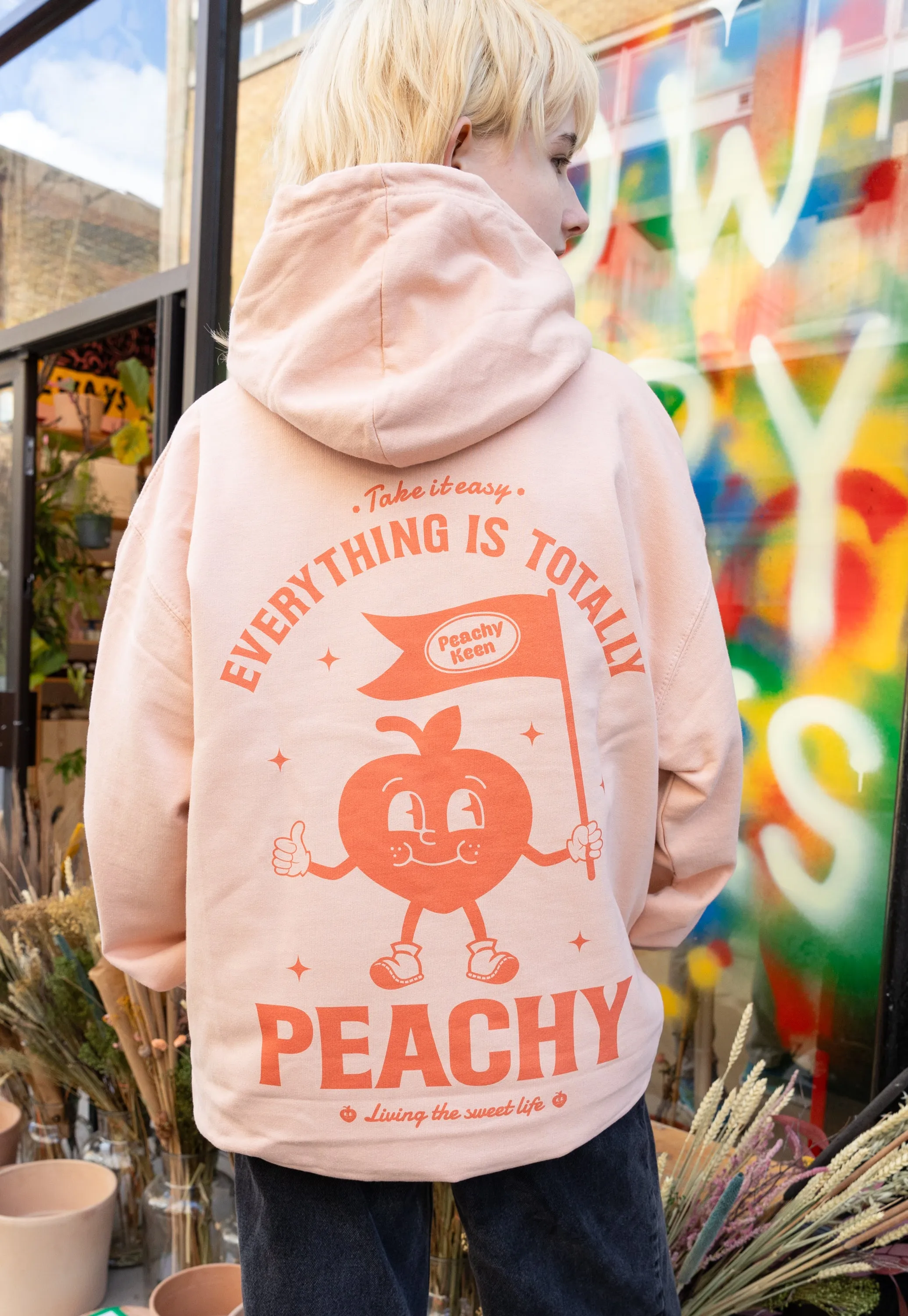 Everything Is Peachy Graphic Hoodie in Peach